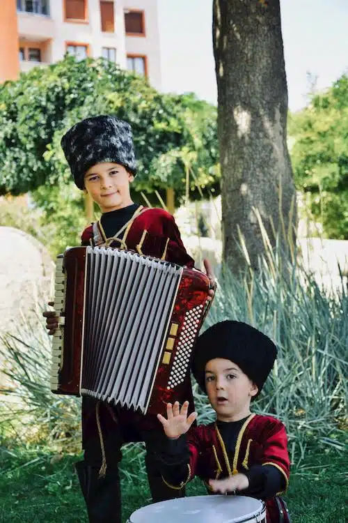 kids playing instruments at a wedding
