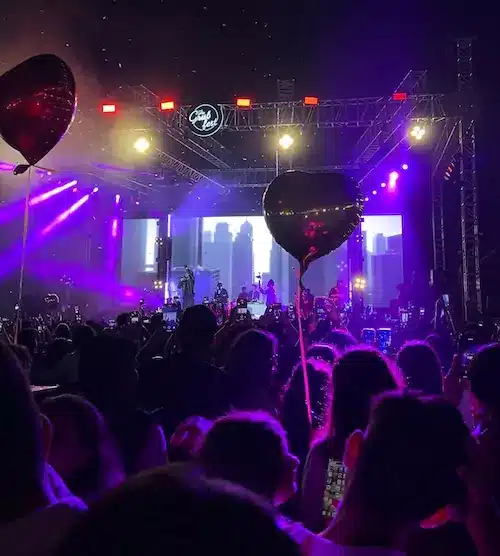 heart balloons at a concert